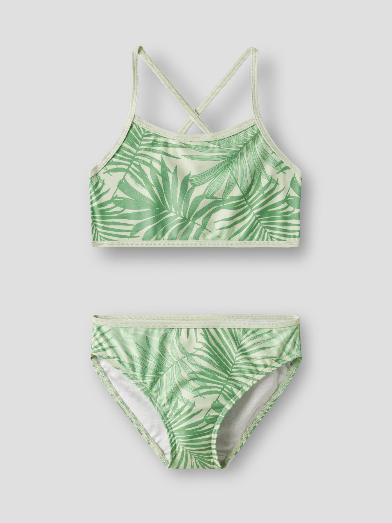 Grön mönstrad bikini med smala korsade axelband. Badkläder bikini till flicka, tjej från Name it.
NKFZIZLA BIKINI BOX TB
13251611