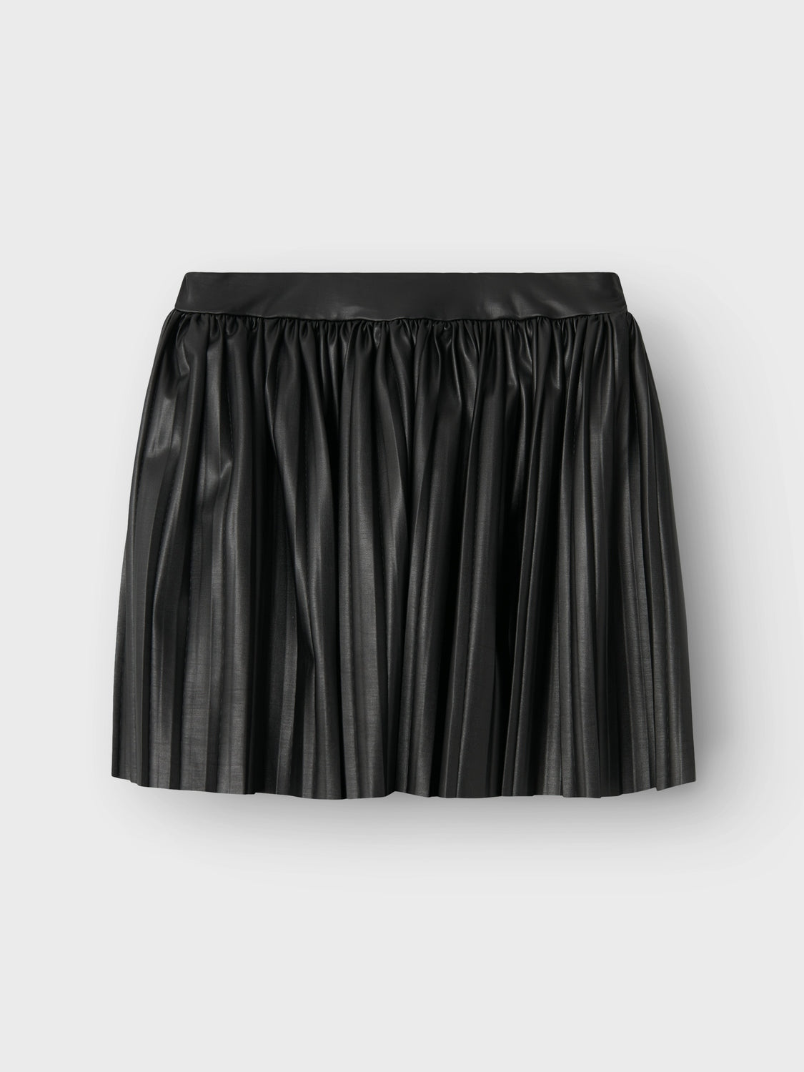 Tuff kjol i svart PU för tjej, flicka, barn och ungdom.
Gör ditt barn redo för alla festliga evenemang eller speciella tillfällen året runt med roliga och glamorösa feststilar. Jersey är ett lätt och stretchigt tyg med en mjuk yta och insida för en bekväm känsla och rörelsefrihet.
Produkttyp: Kjol
Extra detaljer: Plisserad detalj
Tryck: Folietryck för en glänsande look
Huvudmaterialet i denna produkt innehålle