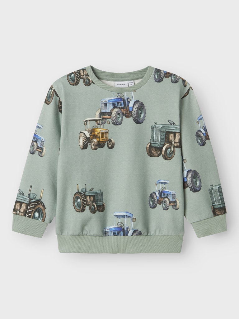 Ljus grön sweat tröja med traktorer till pojke. Ekologiska barnkläder från Name it.
NMMLUDVIG LS NREG SWEAT UNB
13244945
