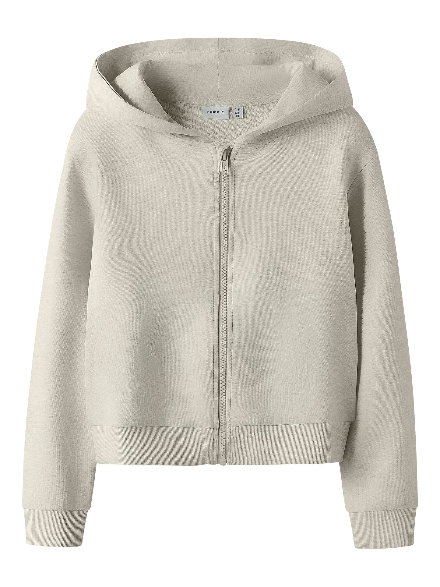 Beige kort luvjacka, cardigan till flicka från Name it. Kofta till tjej barn och ungdom.
NKFMILLE SHORT NREG SWE CARD WH UNB NOOS
13242507