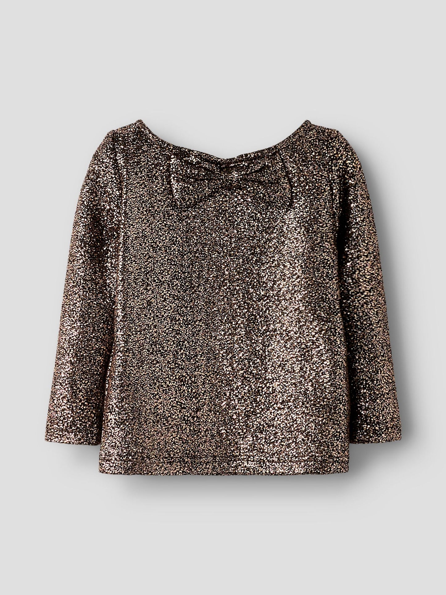 Svart guld glitter topp med rosett bak i nacken. Söt festlig tröja till flicka från Name it.
NMFDITSA LS TOP
13256276