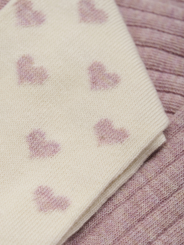 Rosa och natur vita strumpbyxor med hjärtan till flicka. Barn strumpbyxa till flickor från Minymo.
Minymo - Stockings w. pattern (2-pack)
6592 - 507 - Light Rose
