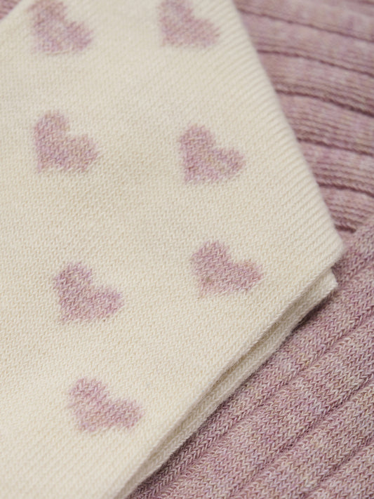 Rosa och natur vita strumpbyxor med hjärtan till flicka. Barn strumpbyxa till flickor från Minymo.
Minymo - Stockings w. pattern (2-pack)
6592 - 507 - Light Rose