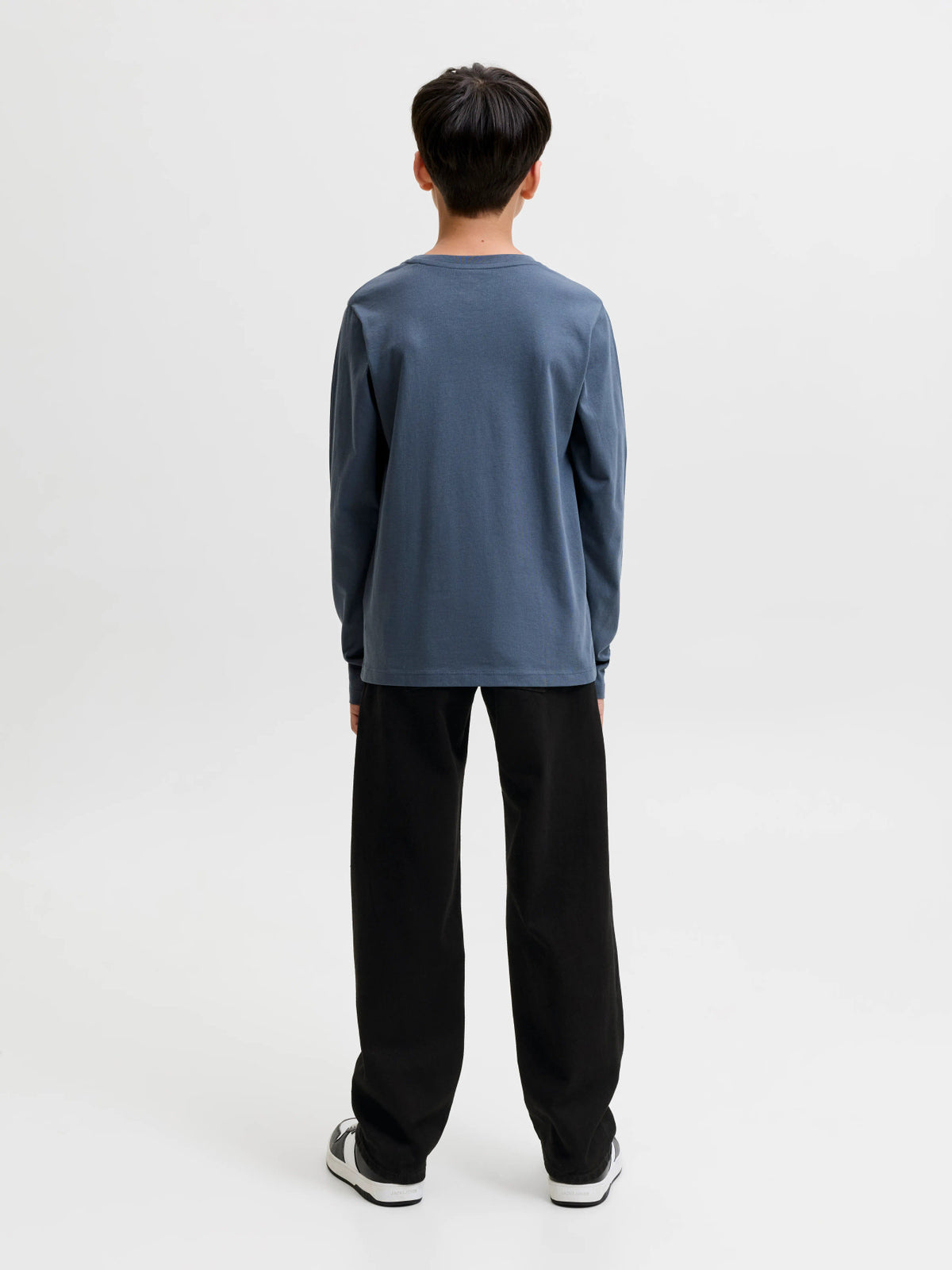 Chris Original svarta relaxed fit jeans från Jack & Jones Junior med hög midja och femficksmodell.