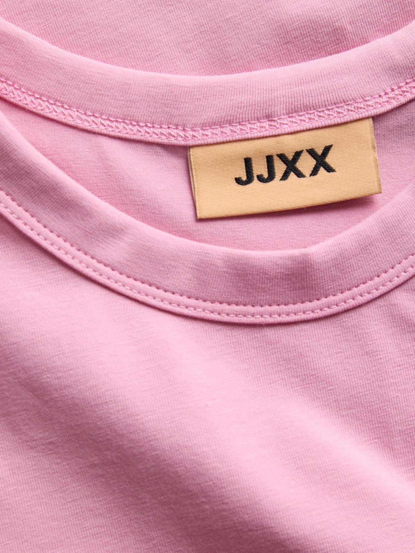 JJXX ljus rosa stretch t-shirt för ungdoms tjej i ekologisk bomull med rund hals och mjuk jerseykvalitet
