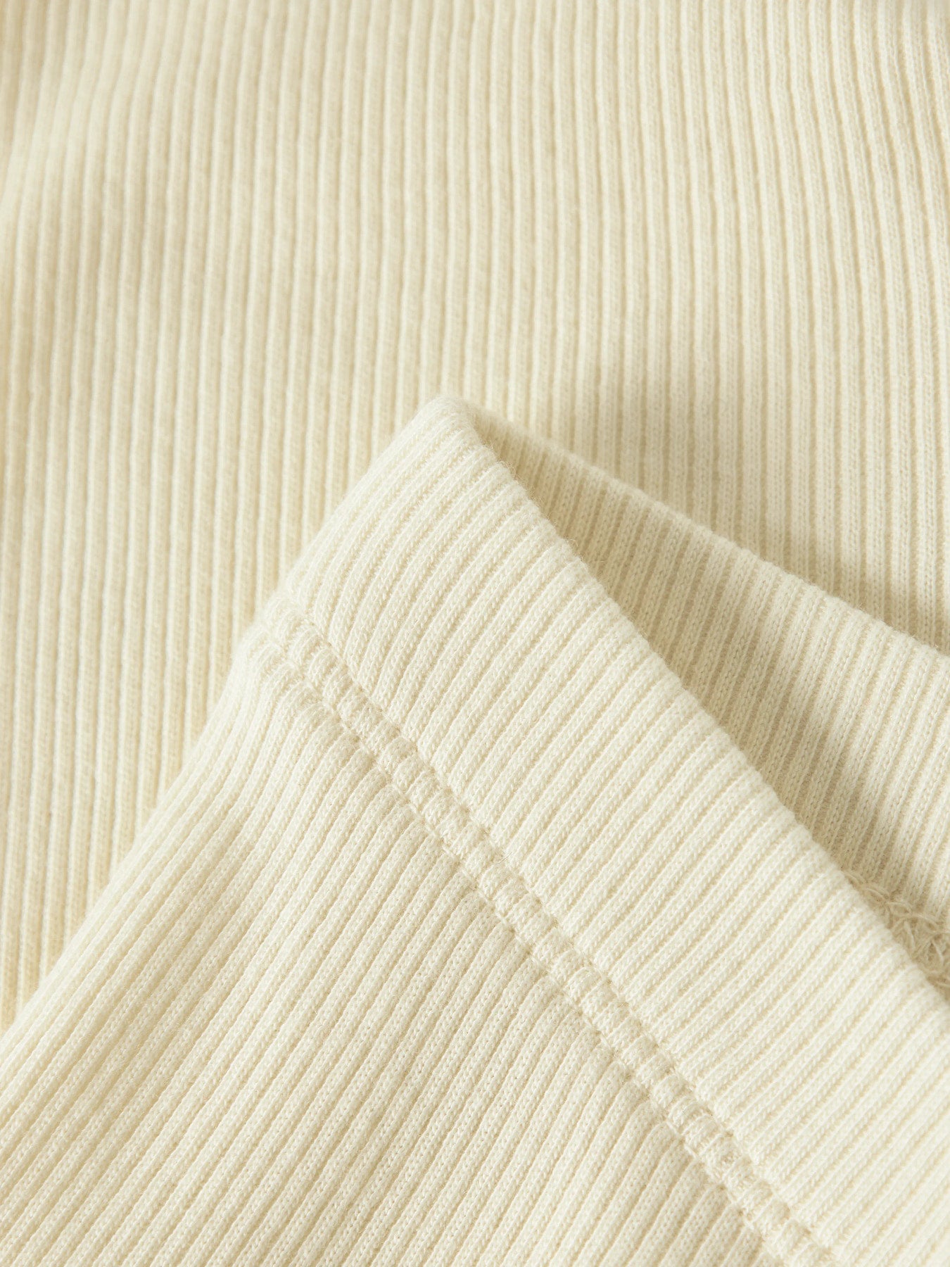 Ljus gul baby leggings i ekologisk bomull. Bebis byxor till flicka i mjuk ribbad kvalitet.
13198040
NBNKAB LEGGING NOOS