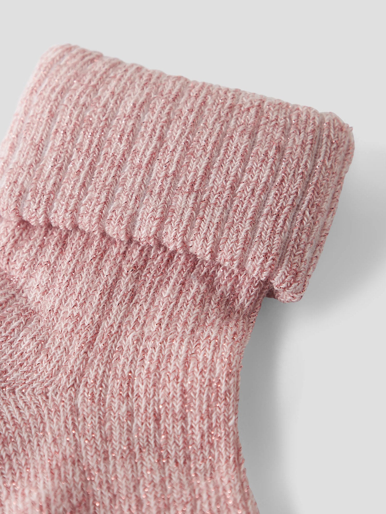 Name It Nobba ribbstickade rosa babystrumpor med glitterdetaljer för baby flicka.