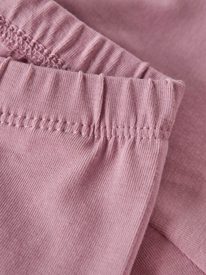 Name It Vuvivian gammelrosa babyleggings i ekologisk bomull med elastisk midja.