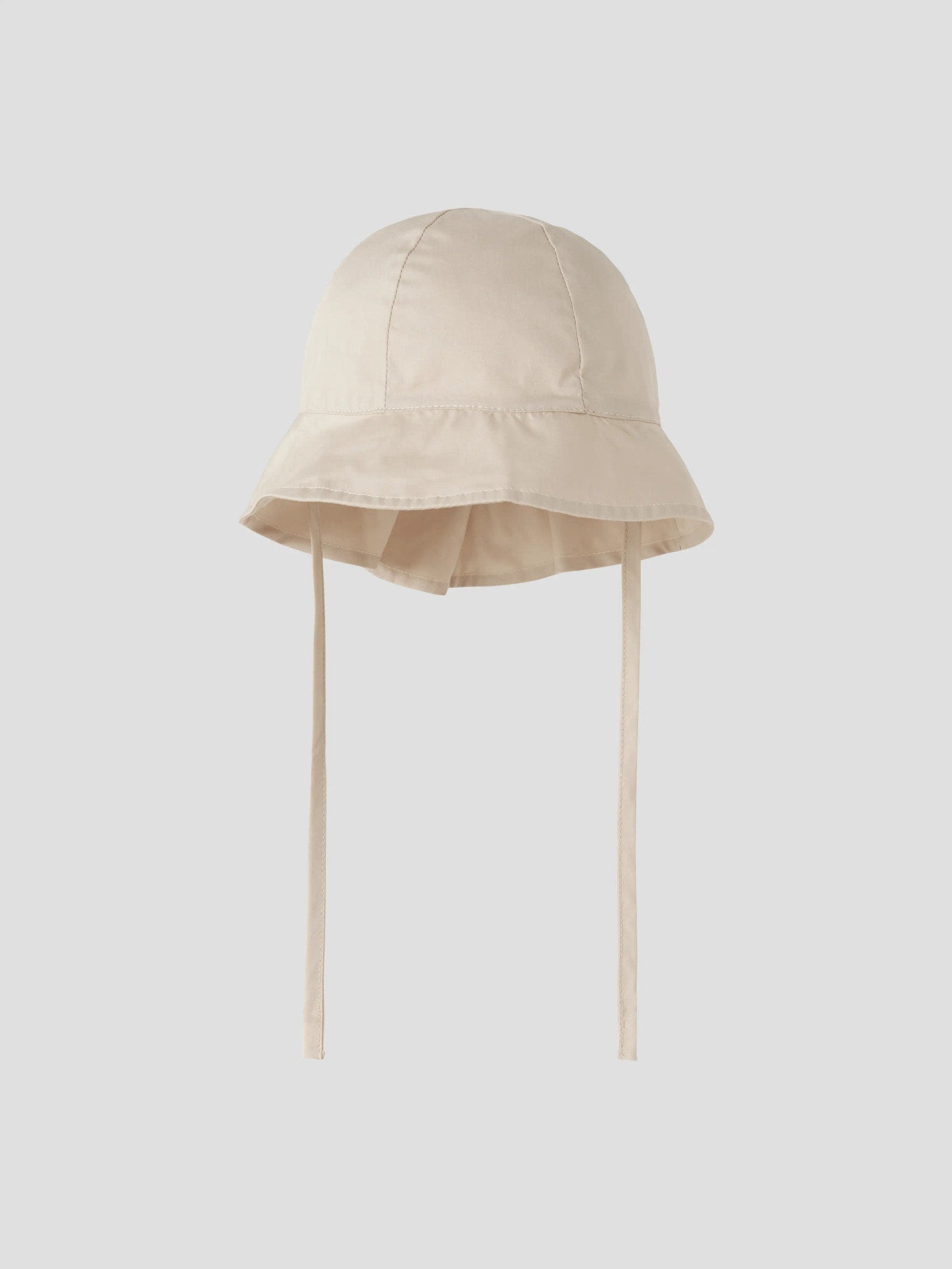 Beige solhatt till barn med band att knyta under hakan. Sol hatt till flicka och pojke från Name it.
NMNZILU UV HAT
13226582