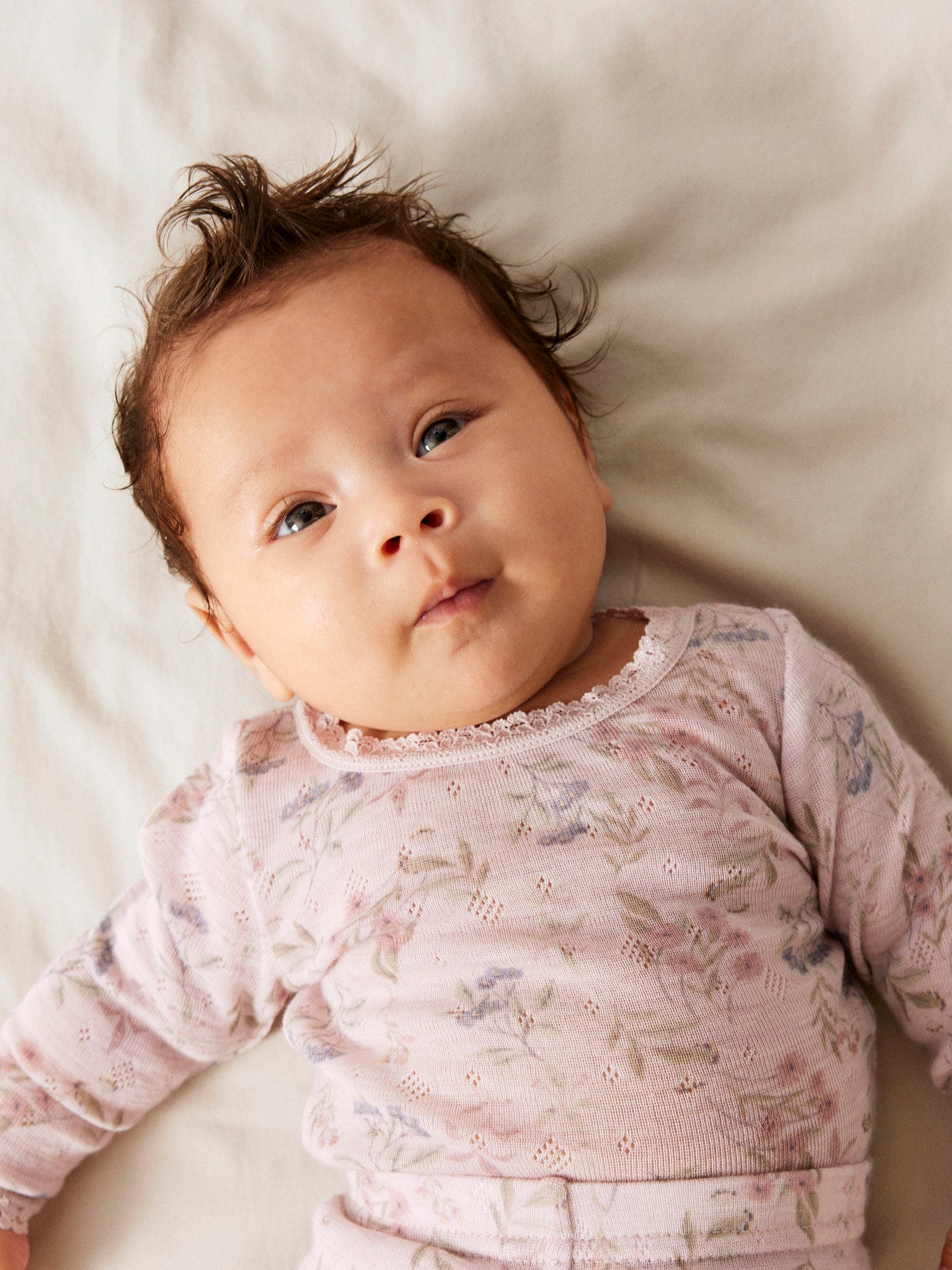 Name It Wang rosa merinoull body med blommor för baby flicka