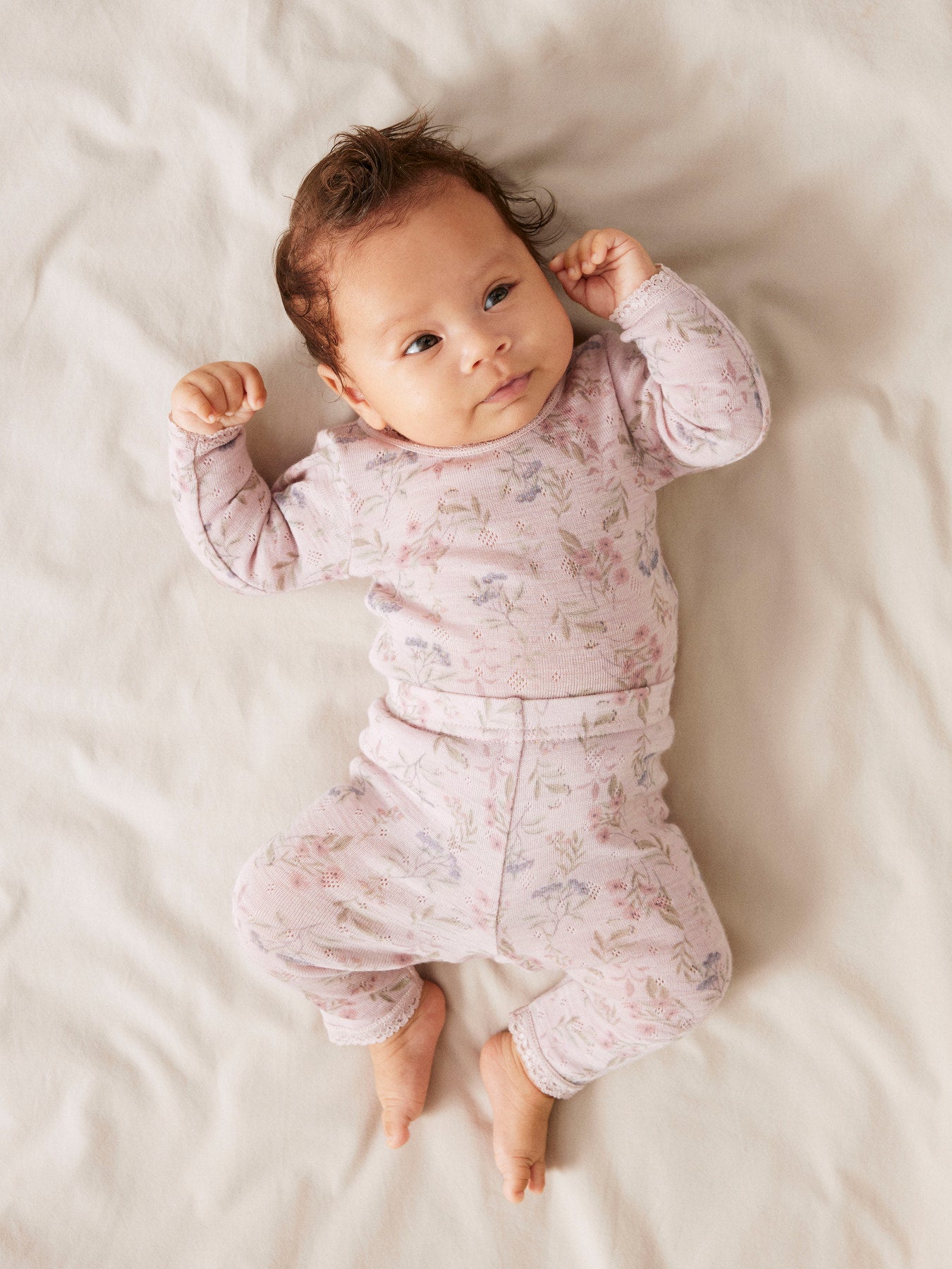 Name It Wang rosa merinoull body med blommor för baby flicka