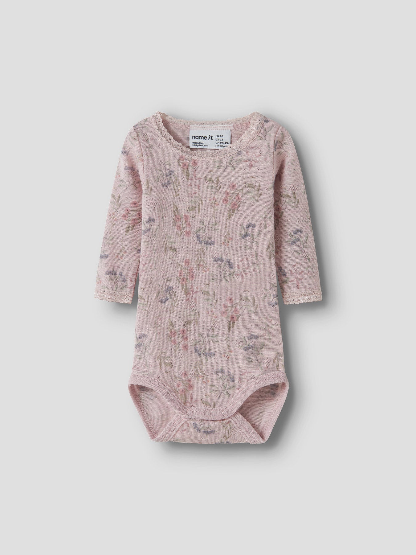Name It Wang rosa merinoull body med blommor för baby flicka