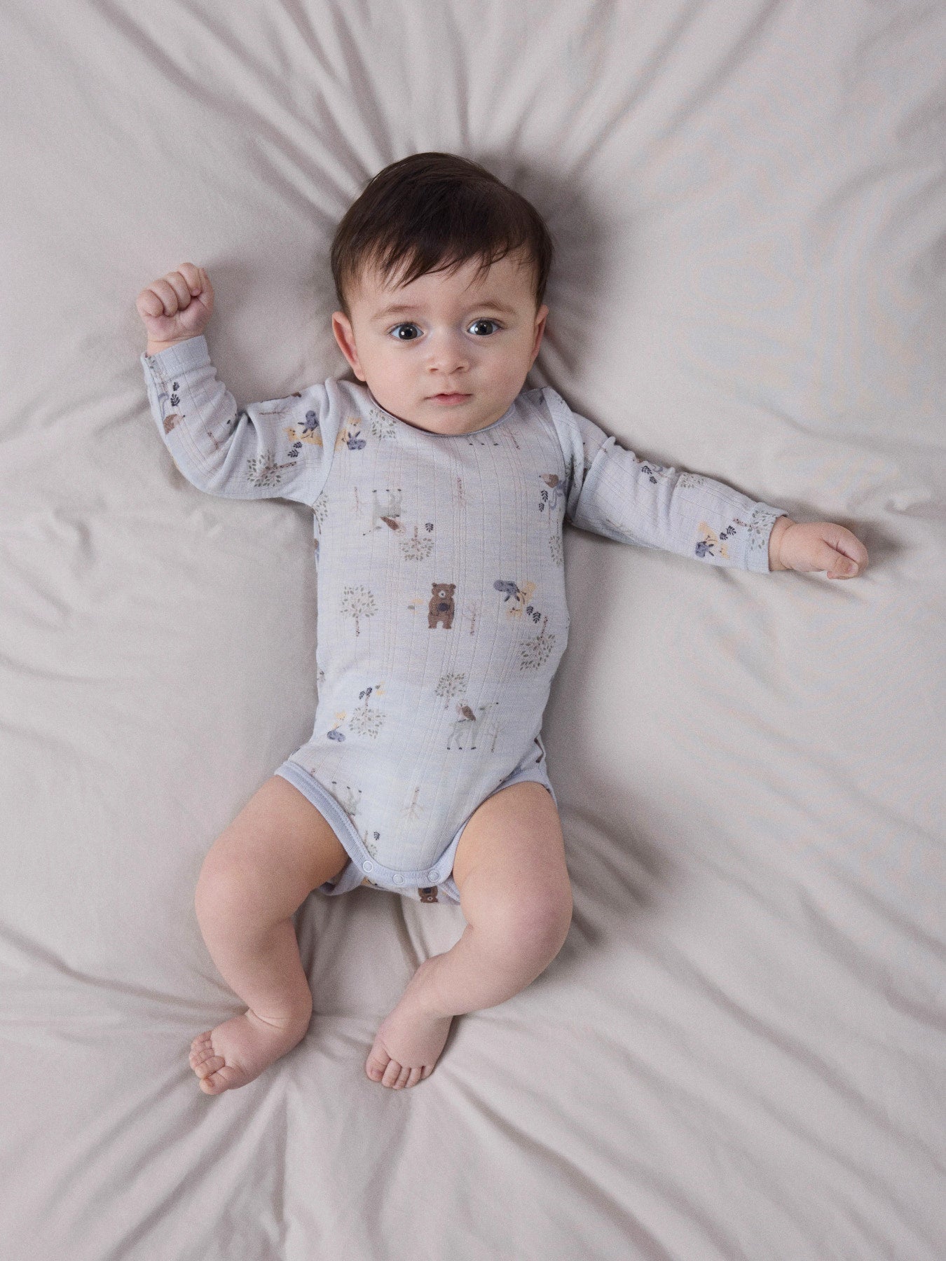 Name It Wang merinoull body Arctic Ice med skogsdjur för baby pojke