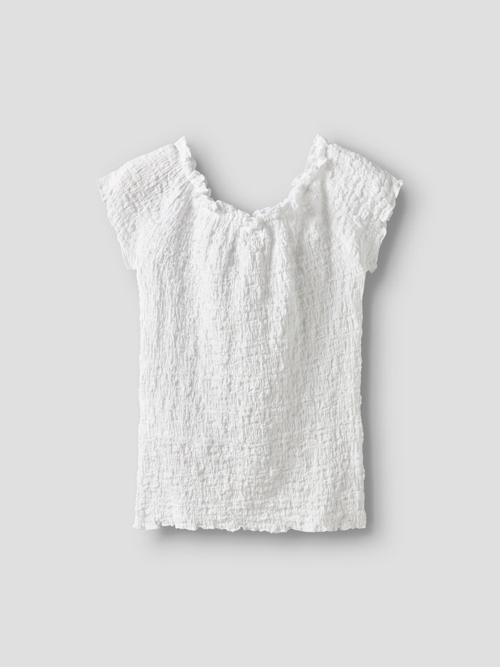Vit kortärmad topp till flicka. Fin rynkig t-shirt till tjej från Name it.
NKFHALISSE SS TOP NOOS
13229981