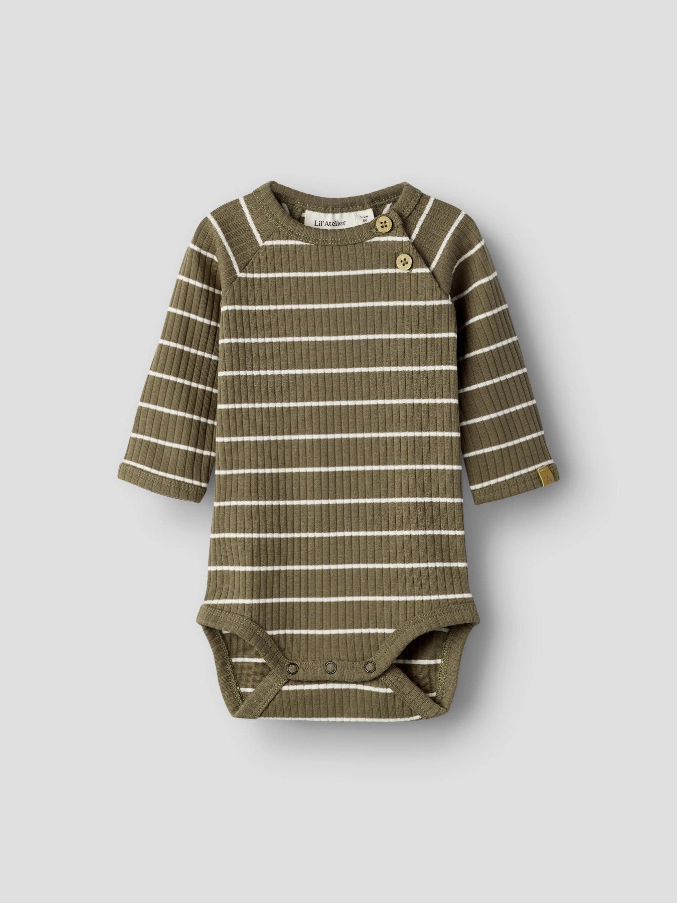Brun och vit randig baby body till pojke. Ekologiska bebis kläder till nyfödd pojke, body suit från Lil 'Atelier.
NBMKAIL LS SLIM BODY LIL NOOS
13232014
