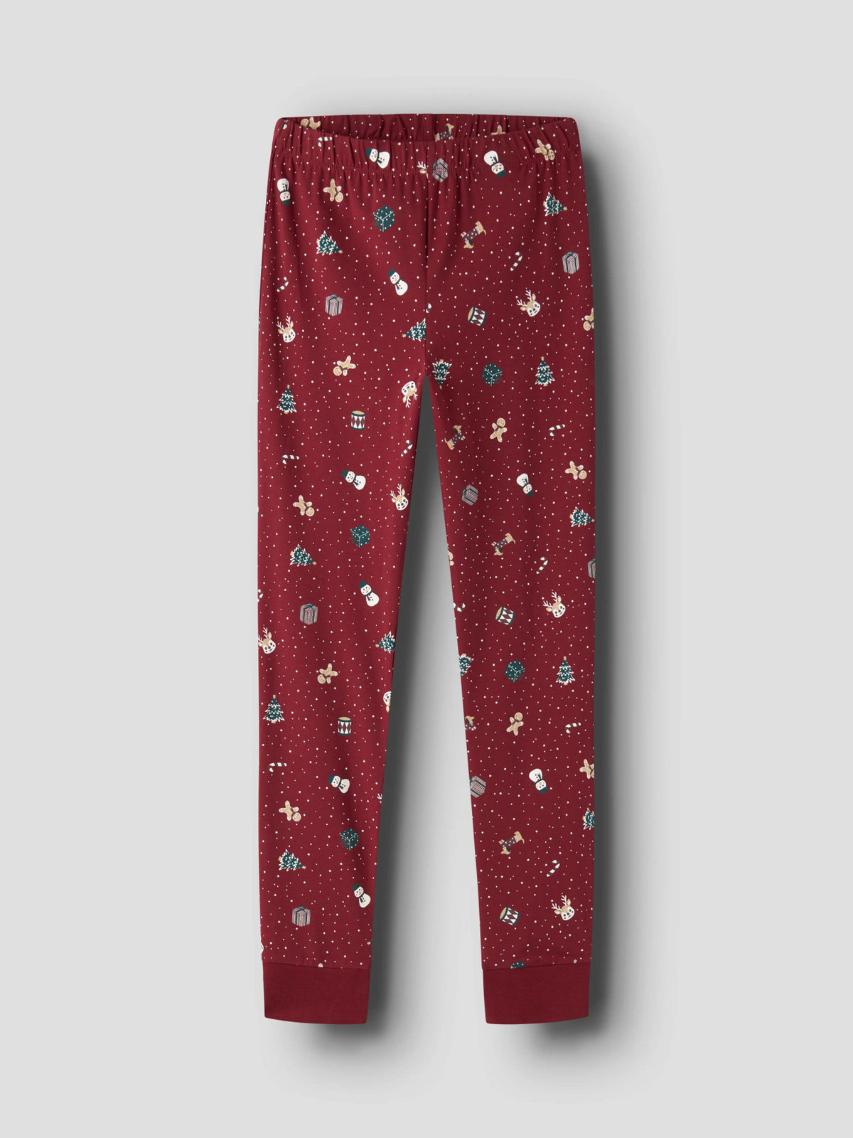 Ismas julpyjamas byxa med långärmad tröja och byxor i rött med julmotiv till flicka och pojke.