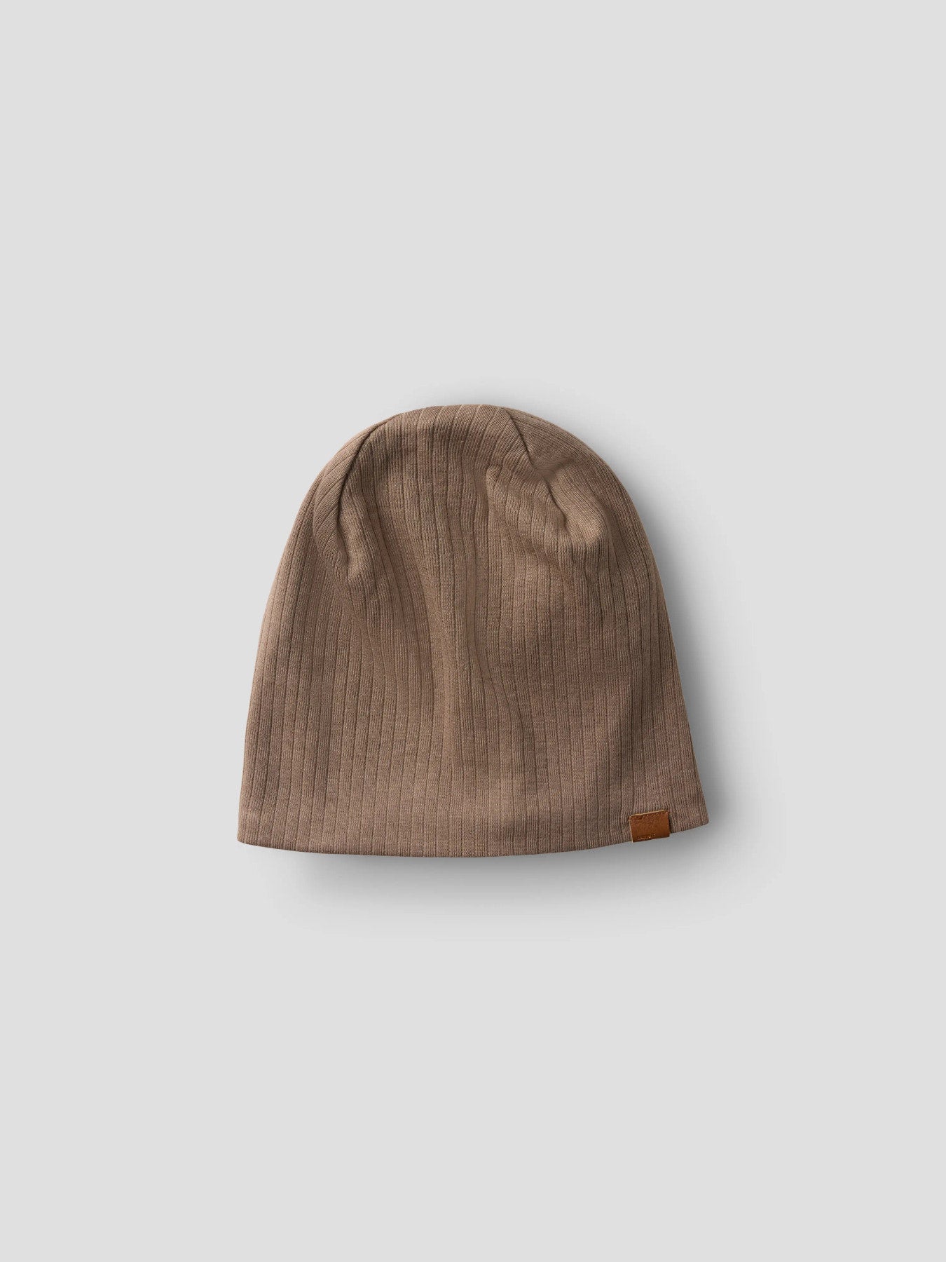 Ribbad beige tunn vår mössa till pojke. Mjuk skön mössa i ekologisk bomull från Name it.
NMNMEX BEANIE
13238330