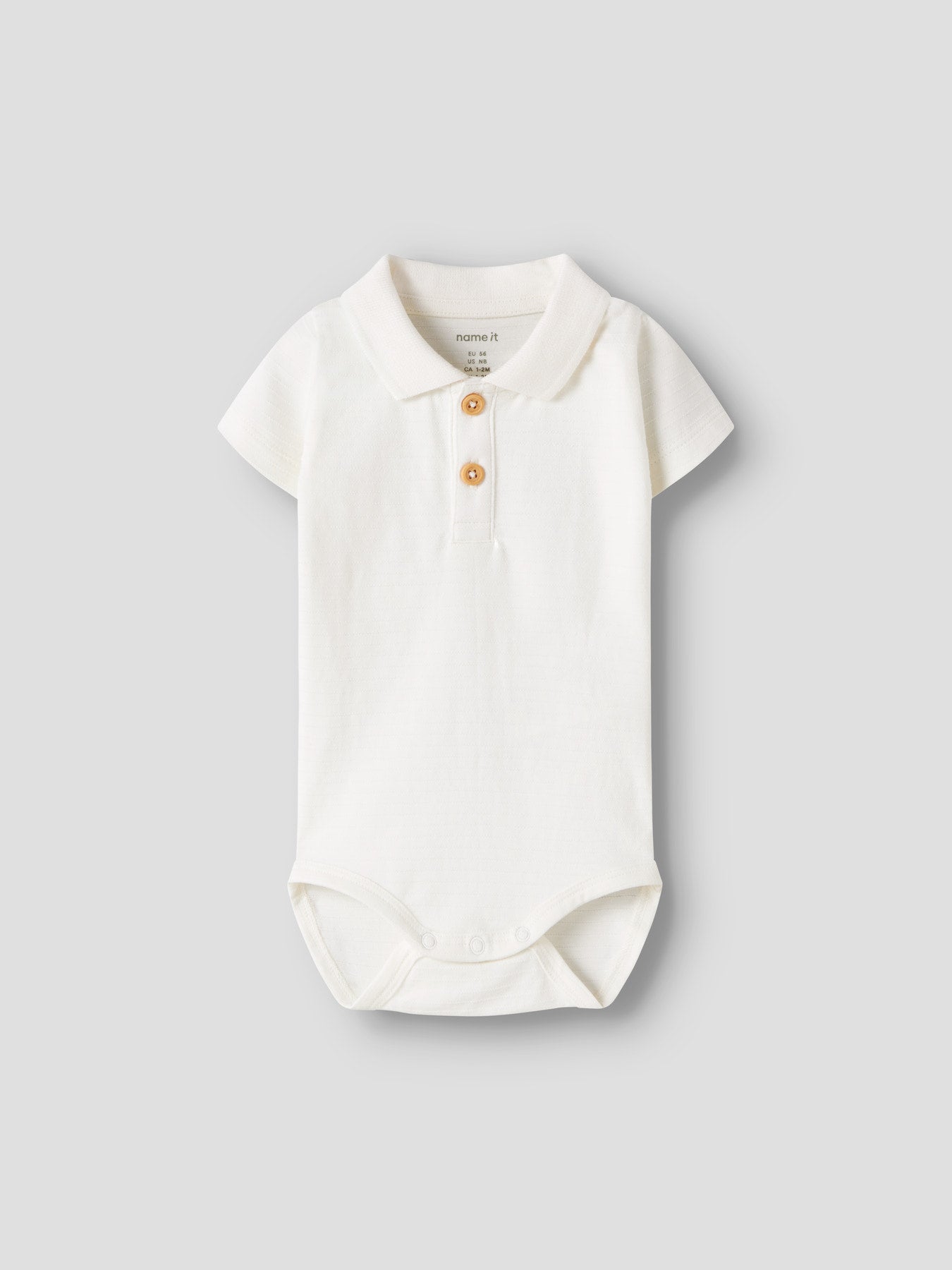 Vit kortärmad piké body från Name it till baby pojke. Bebis polo body med krage och knappar till nyfödd baby pojke.
NBMHOFMAN SS POLO BODY
13242925