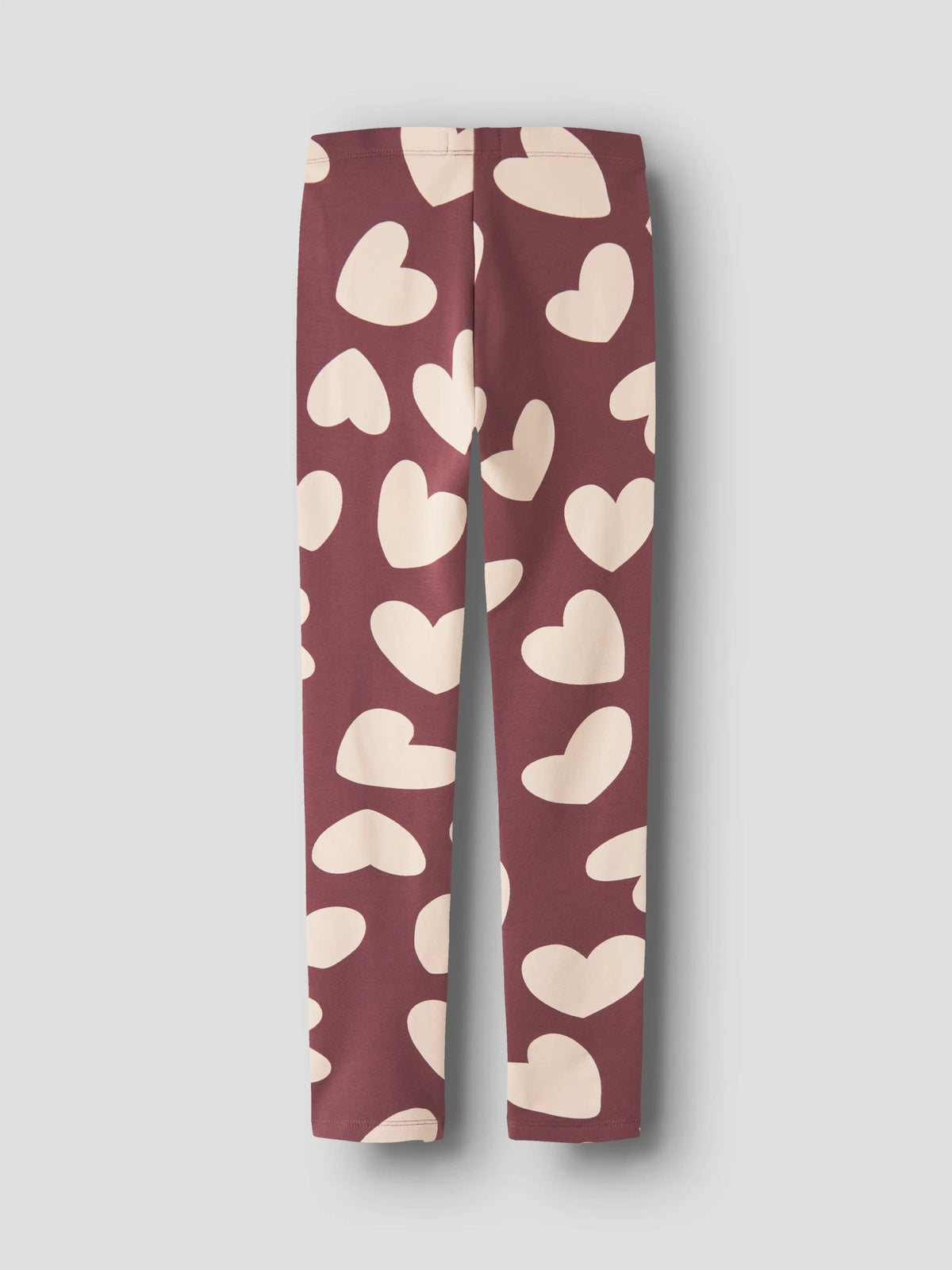 Name It Davina sweatleggings till flicka i färgen Wild Ginger med stora vita hjärtan.