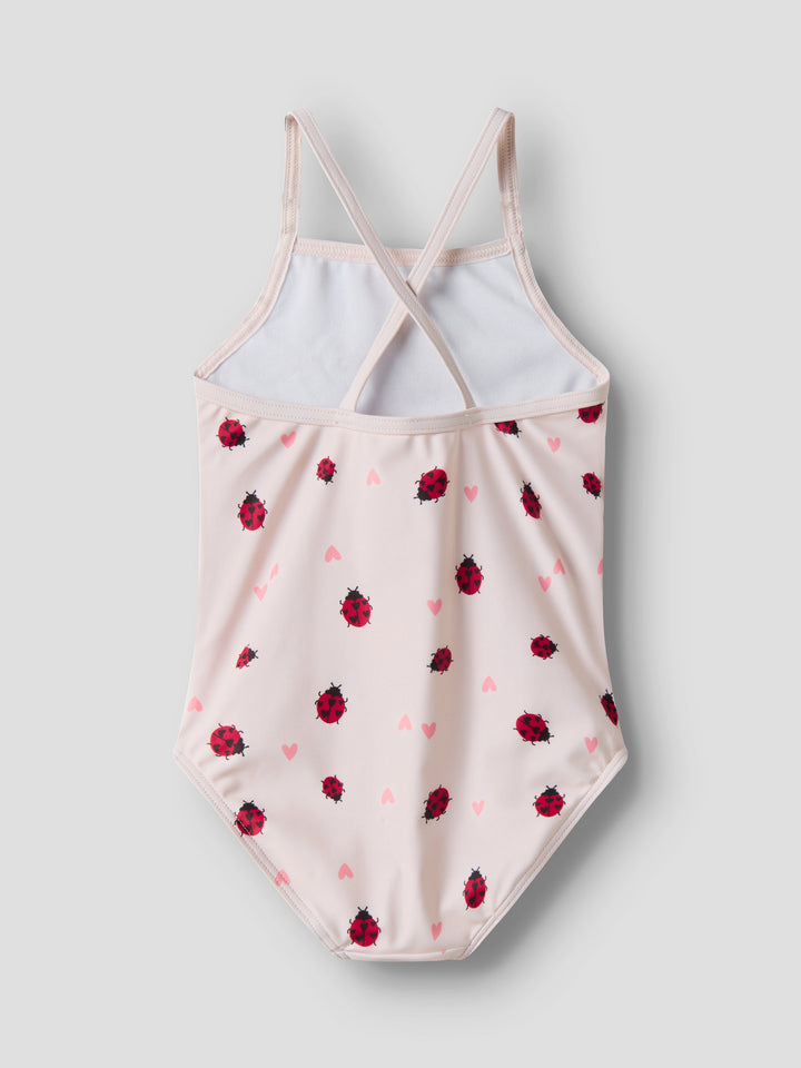 Ljus rosa baddräkt med nyckelpigor  med korsade axelband till flicka. Badkläder från Name it, baddräkt mönstrad färgglad till flicka.
NMFZIZLA SWIMSUIT BOX TB
13251615