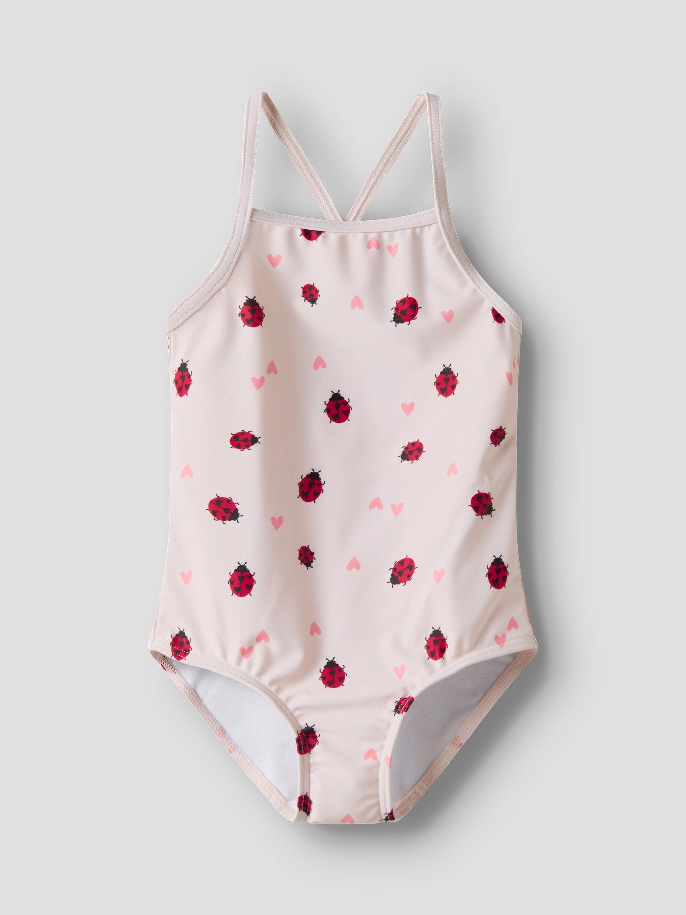 Ljus rosa baddräkt med nyckelpigor  med korsade axelband till flicka. Badkläder från Name it, baddräkt mönstrad färgglad till flicka.
NMFZIZLA SWIMSUIT BOX TB
13251615