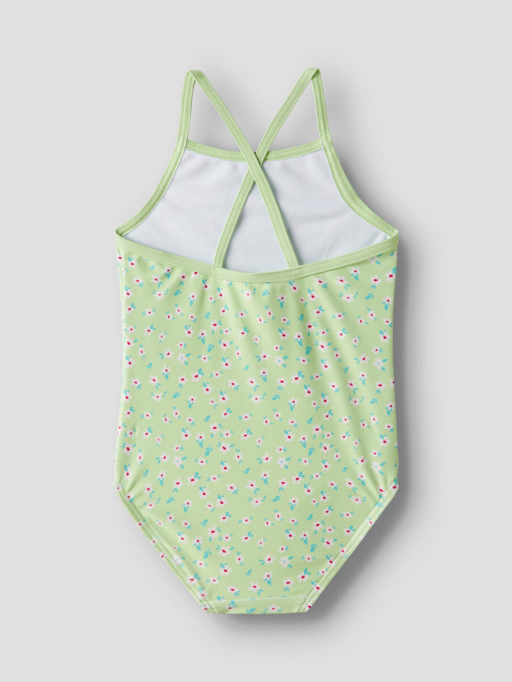 Små blommig söt grön baddräkt med korsade axelband till flicka. Badkläder från Name it, baddräkt mönstrad färgglad till flicka.
NMFZIZLA SWIMSUIT BOX TB
13251615