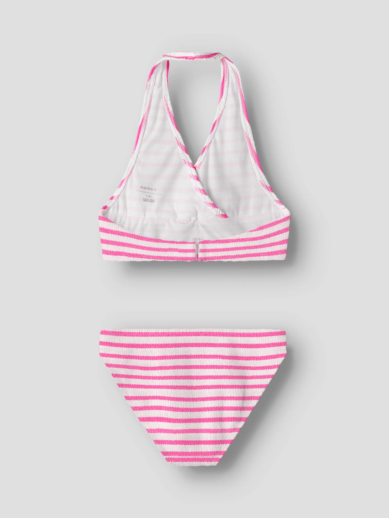 Rosa randig halterneck bikini till tjej. Badkläder till flicka, randig bikini topp med rosett fram, samt randig bikini trosa till barn, ungdom från Name it.
NKFZIPPA BIKINI
13253288