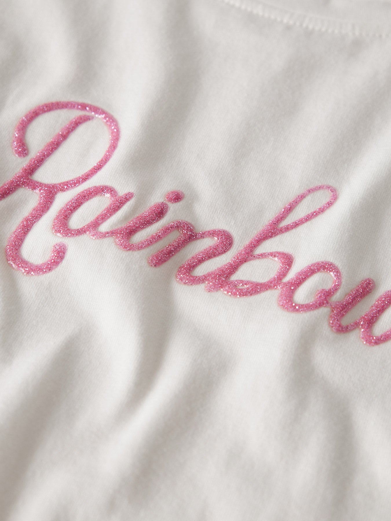 Vit kortärmad topp med glitter text Rainbow. Söt t-shirt till flicka i ekologisk bomull från Name it.
NMFDYBBA SS TOP
13254191