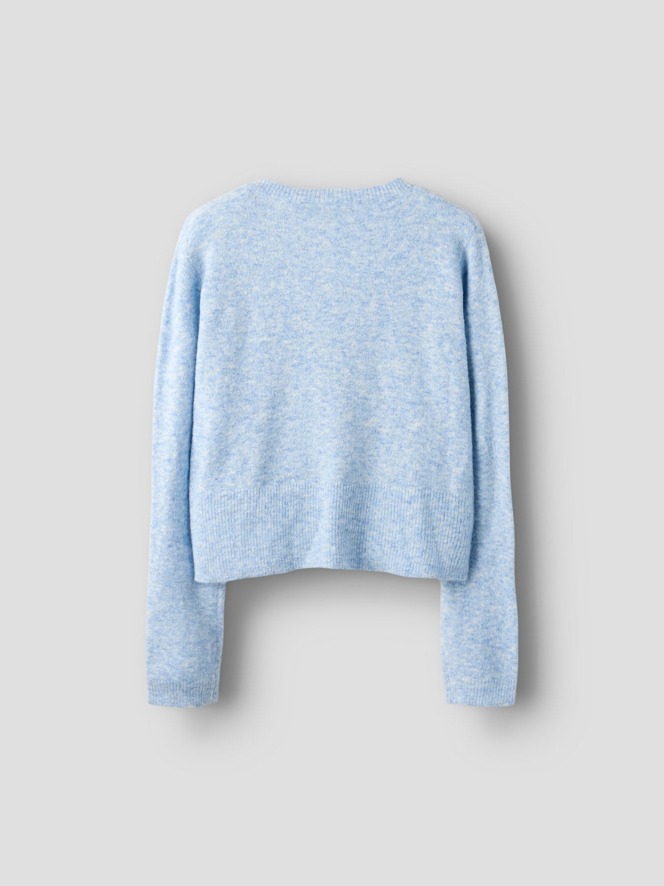 Blå stickad kofta till ungdom flicka. Långärmad tröja i stickad mjuk kvalitet, omlott cardigan till tjej från LMTD. Ungdomskläder till tjej.
NLFKLEAVEHEART LS SHORT WRAP KNIT
13254748