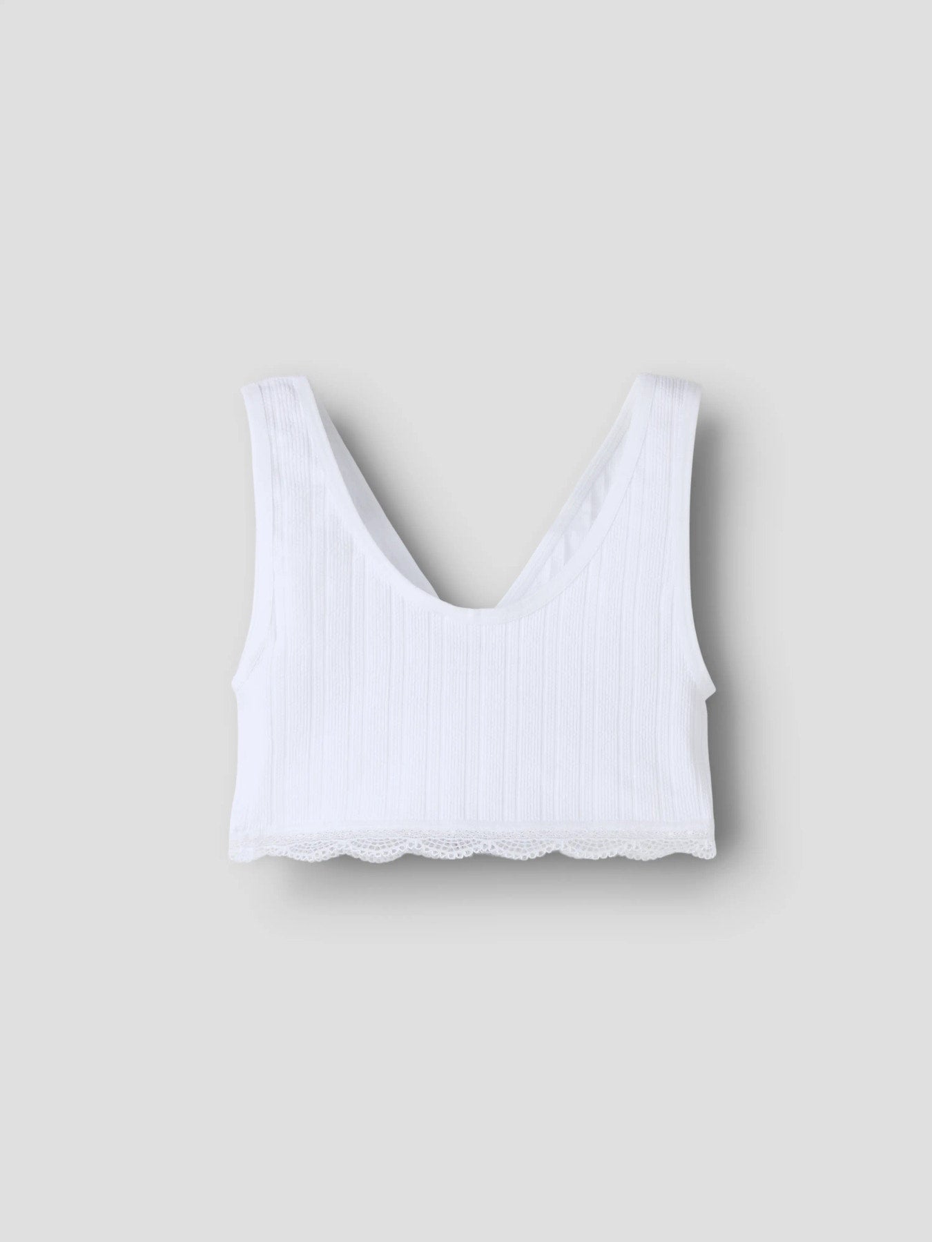 Vit bh topp, kort linne som en bralette till flicka. Tjej topp till ungdom från LMT.
NLFHANNI BRALETTE
13254792