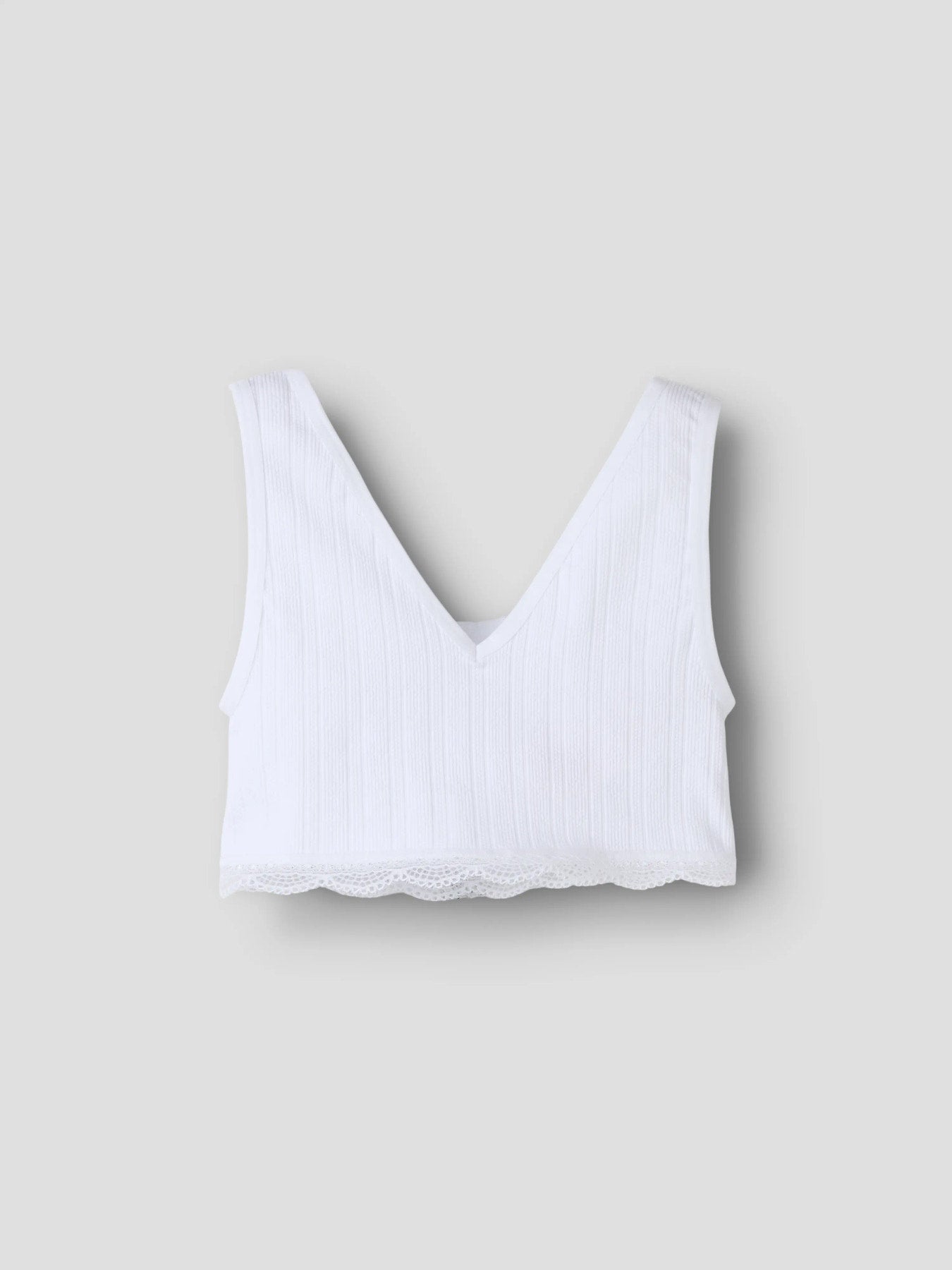 Vit bh topp, kort linne som en bralette till flicka. Tjej topp till ungdom från LMT.
NLFHANNI BRALETTE
13254792