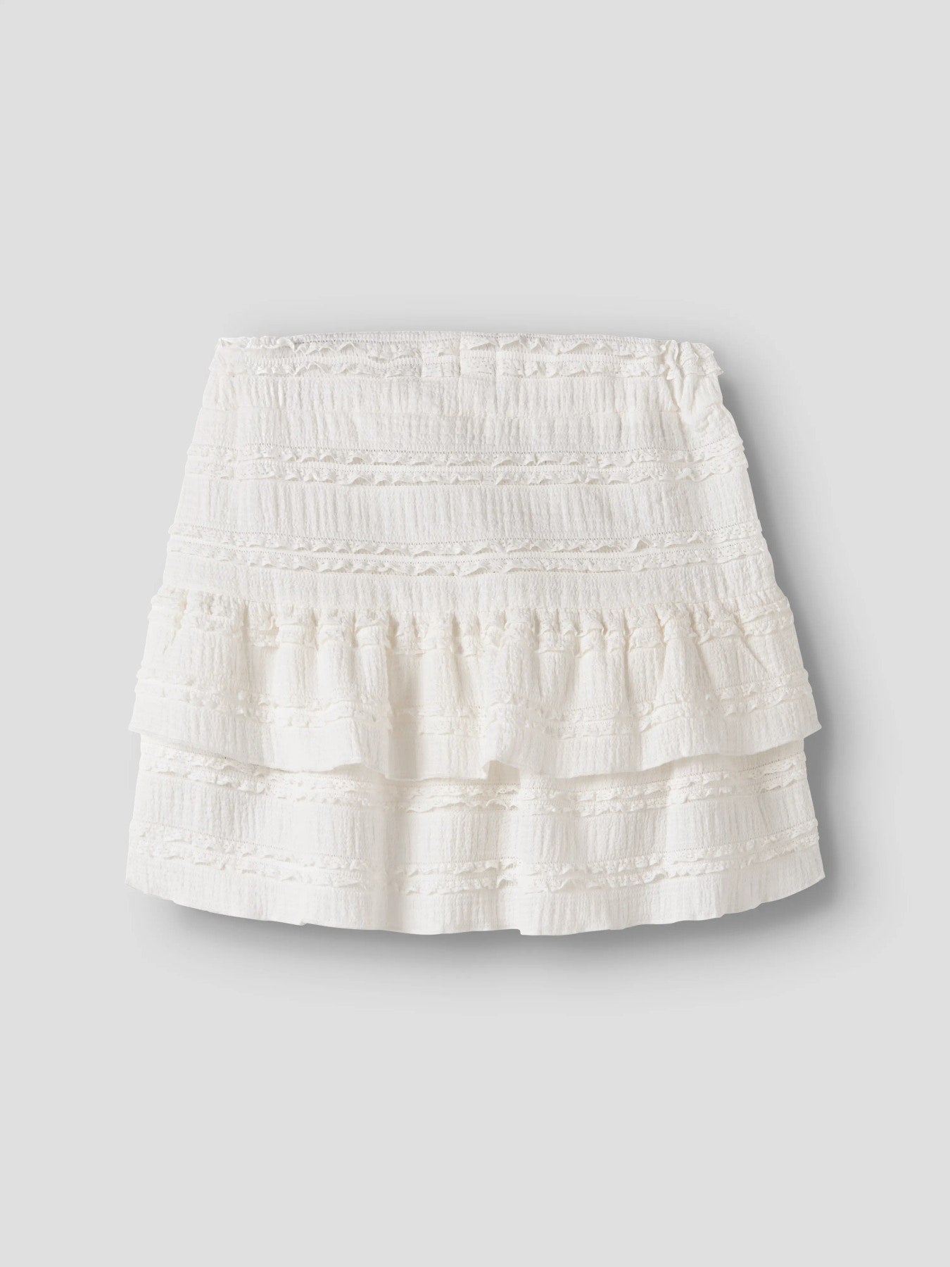 Vit volang kjol till flicka. Fin sommar kjol i kort modell med volanger till flicka, tjej barn och ungdom.
NKFHALDORA SKIRT
13255466