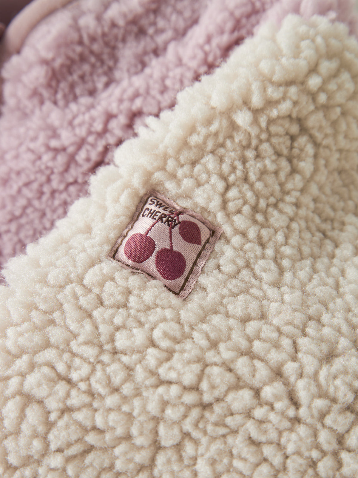 Name It Macey teddyjacka Violet Ice bakifrån – rosa creme för baby flicka