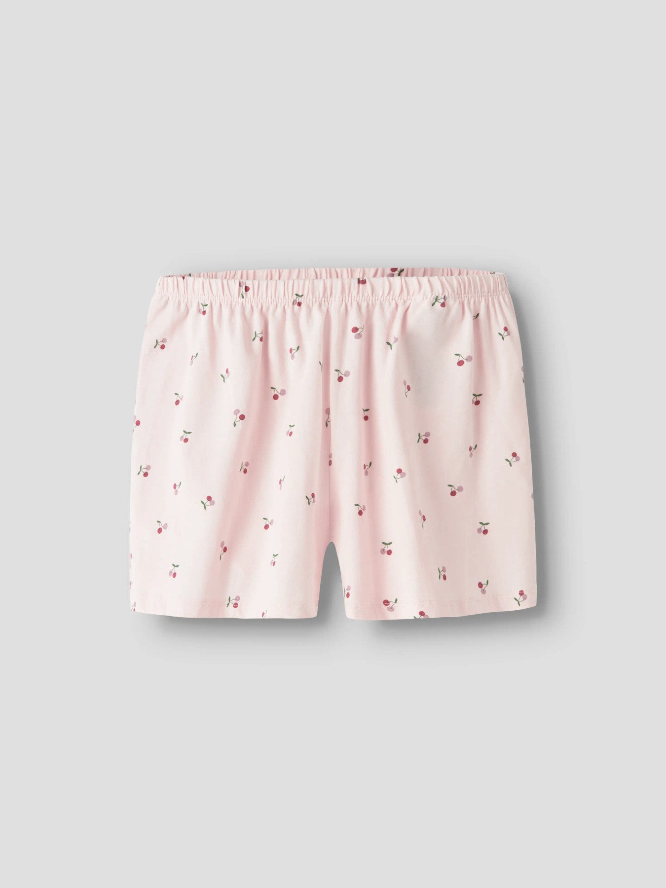 Rosa kortbent pyjamas med t-shirt. Söt mönstrad sommar pyjamas till flicka med små körsbär. Ekologiska barnkläder och pyjamas från Name it.
NKFNIGHTSET BOXY CHERRY NOOS
13257119