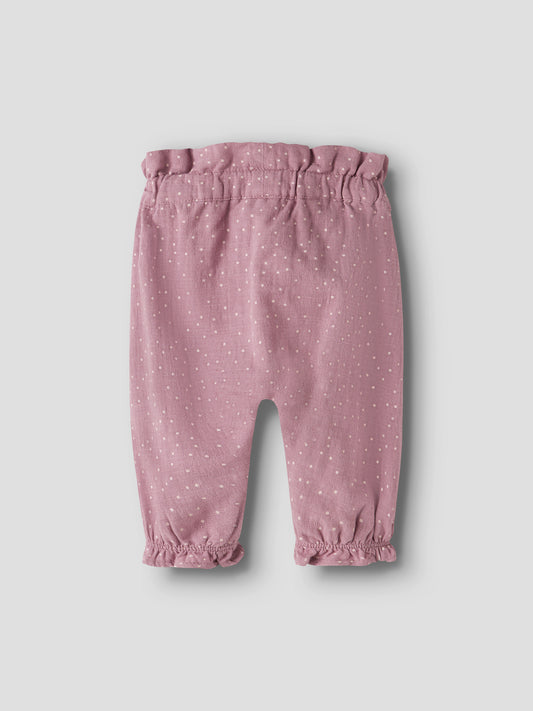 Name It Lalou byxor för babyflicka med vita prickar, rosett i midjan och volangdetaljer