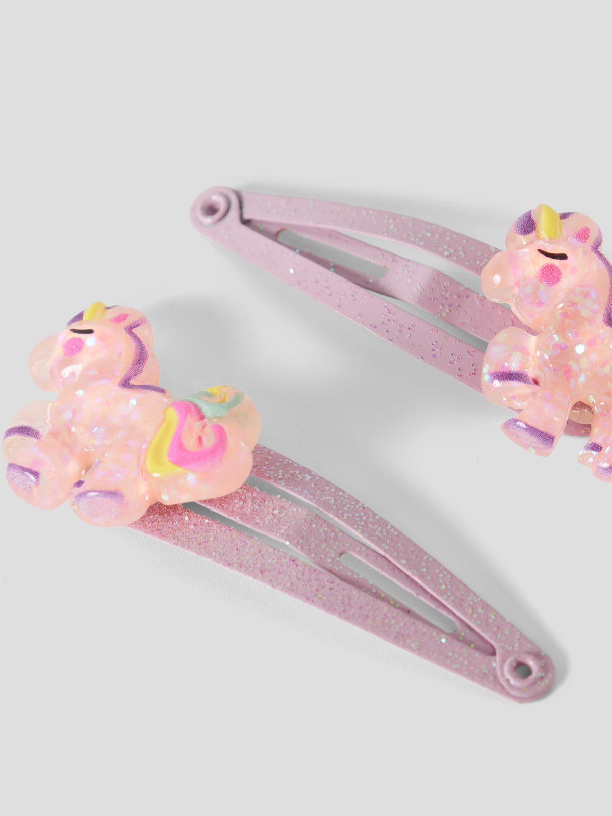 name it hårspännen 2-pack för flicka med glittrig enhörning på klickspännen.