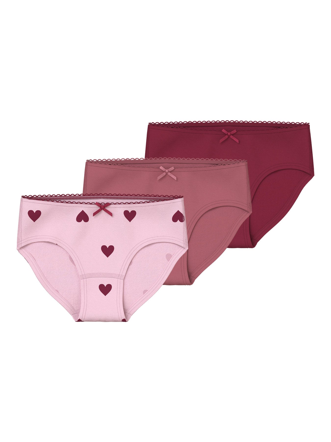 3-pack trosor för flicka från name it i rosa nyanser med hjärtmönster, spetskant och små rosetter i mjuk ekologisk bomull med stretch.