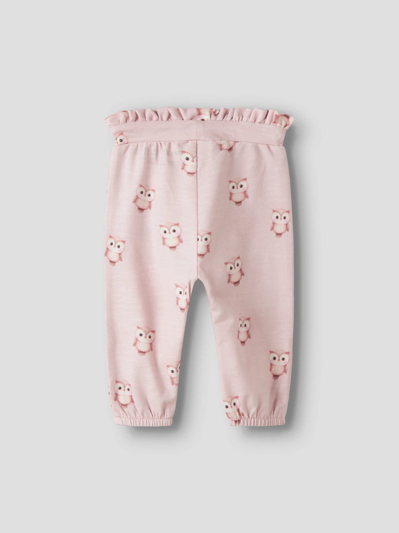 Name It Netie ljusrosa babybyxa i färgen Lotus med ugglemönster, volangmidja och rosett för flicka