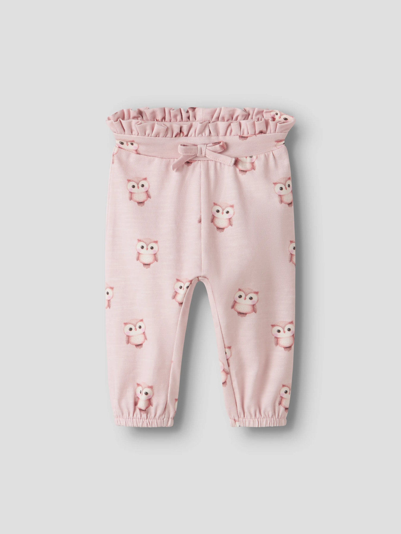 Name It Netie ljusrosa babybyxa i färgen Lotus med ugglemönster, volangmidja och rosett för flicka