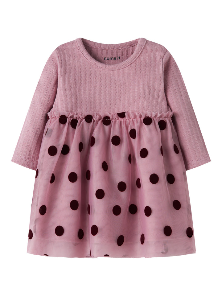 Name It Nagina rosa babyklänning till flicka med lång ärm och prickig tyllkjol.