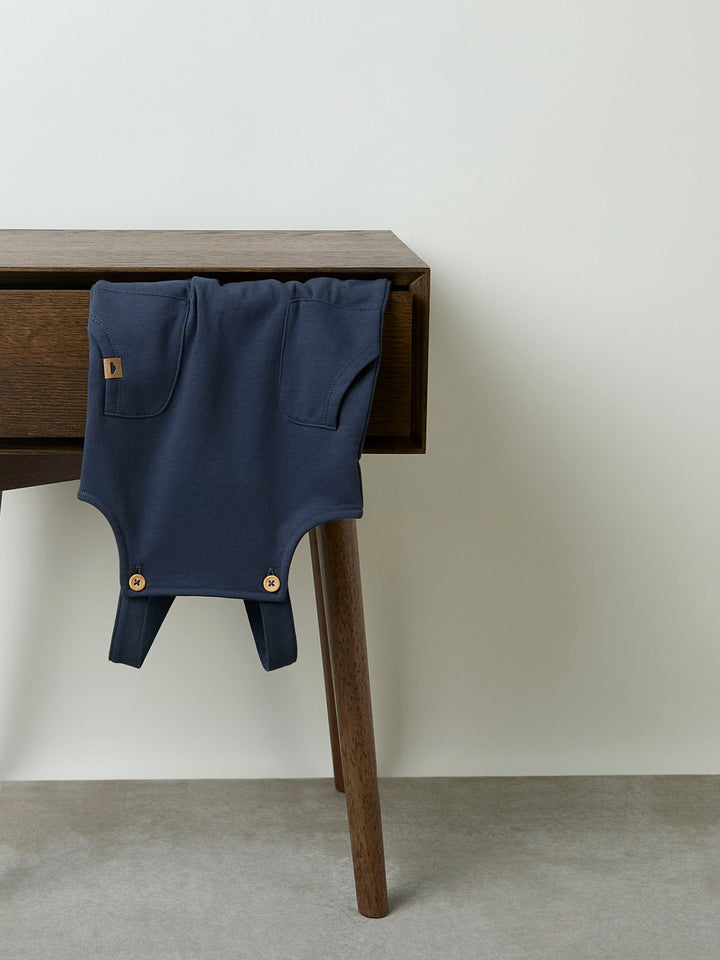 Name It Neil blå babyoverall Olive Night med hängslen och fickor för pojke baby