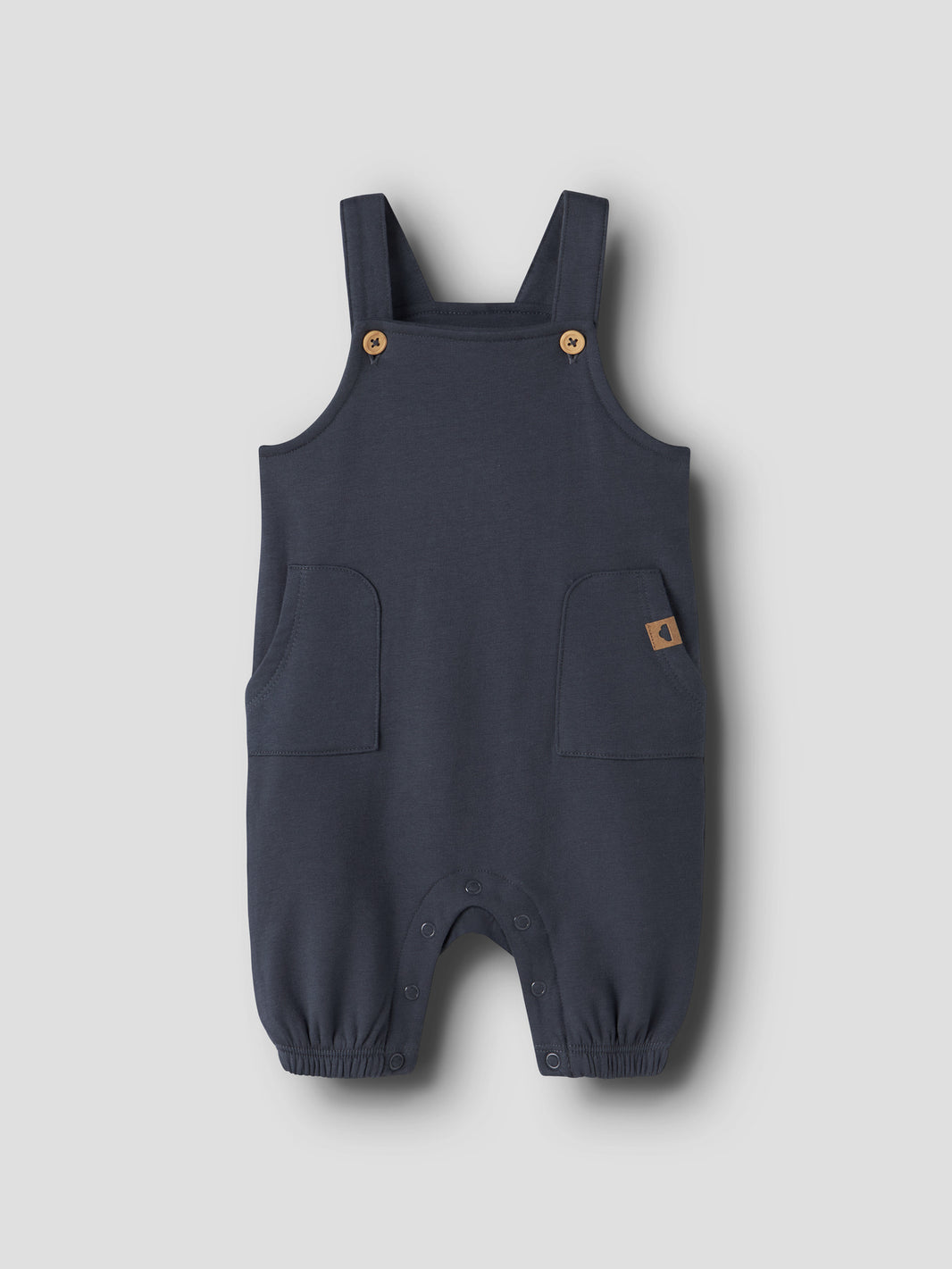 Name It Neil blå babyoverall Olive Night med hängslen och fickor för pojke baby