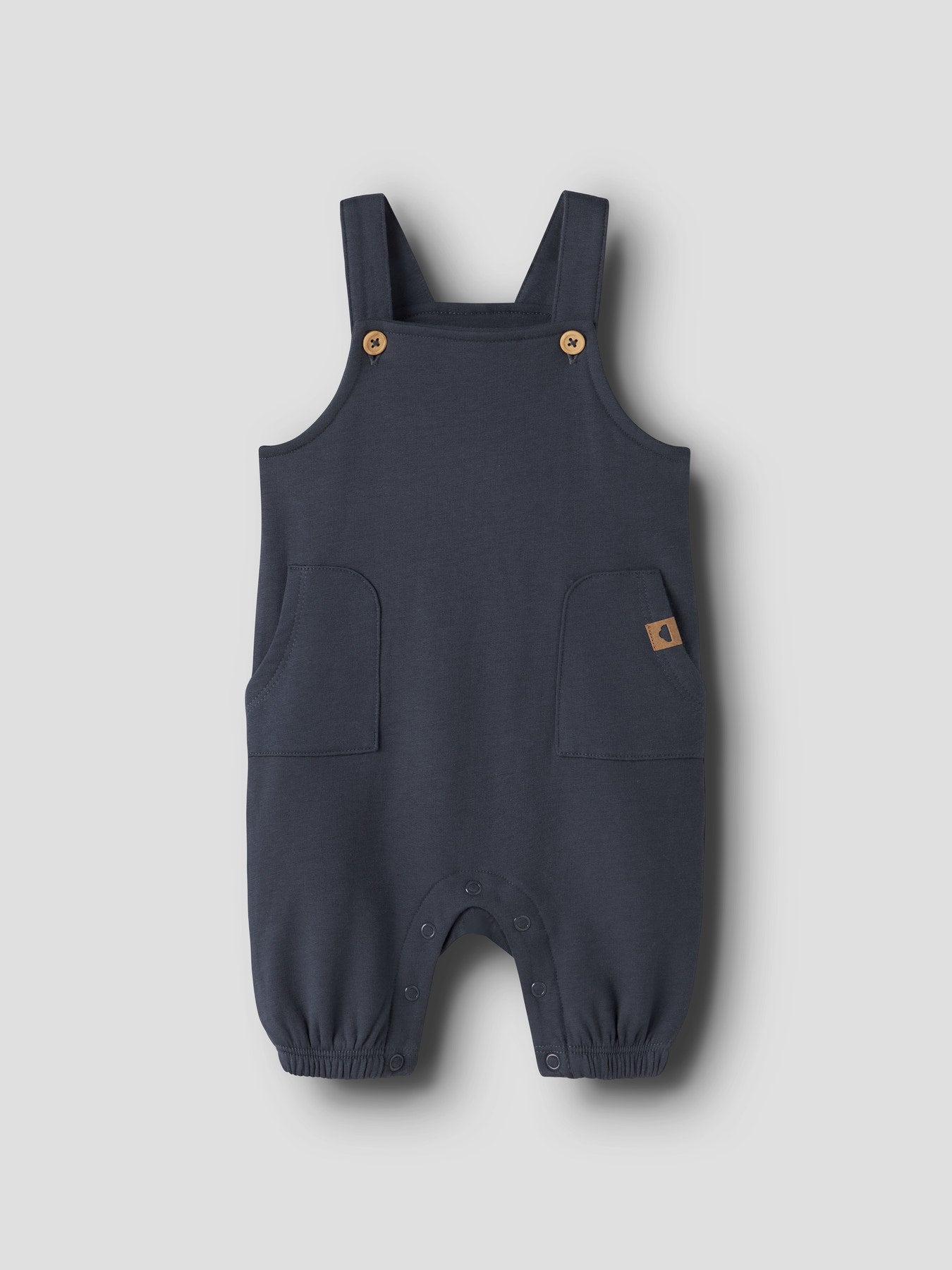 Name It Neil blå babyoverall Olive Night med hängslen och fickor för pojke baby