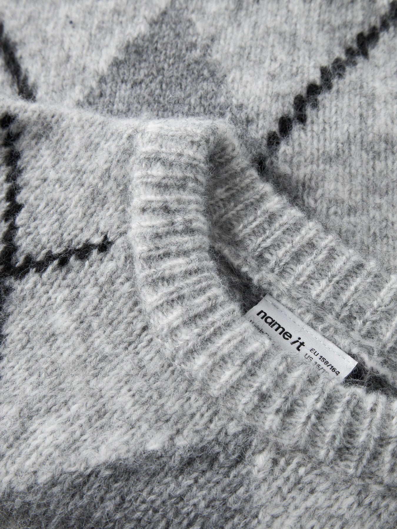 Name It Noreen stickad tröja Light Grey Melange med grått rutmönster för kids flicka