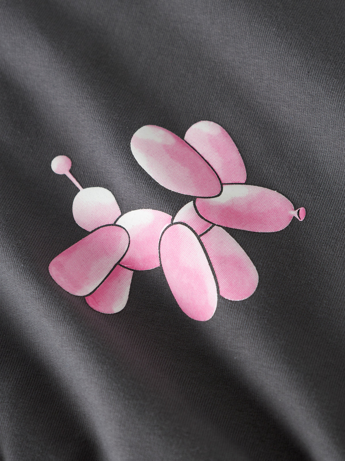 Mörkgrå lång sweatshirt för flicka från Name It med rosa och blå ballonghundar.