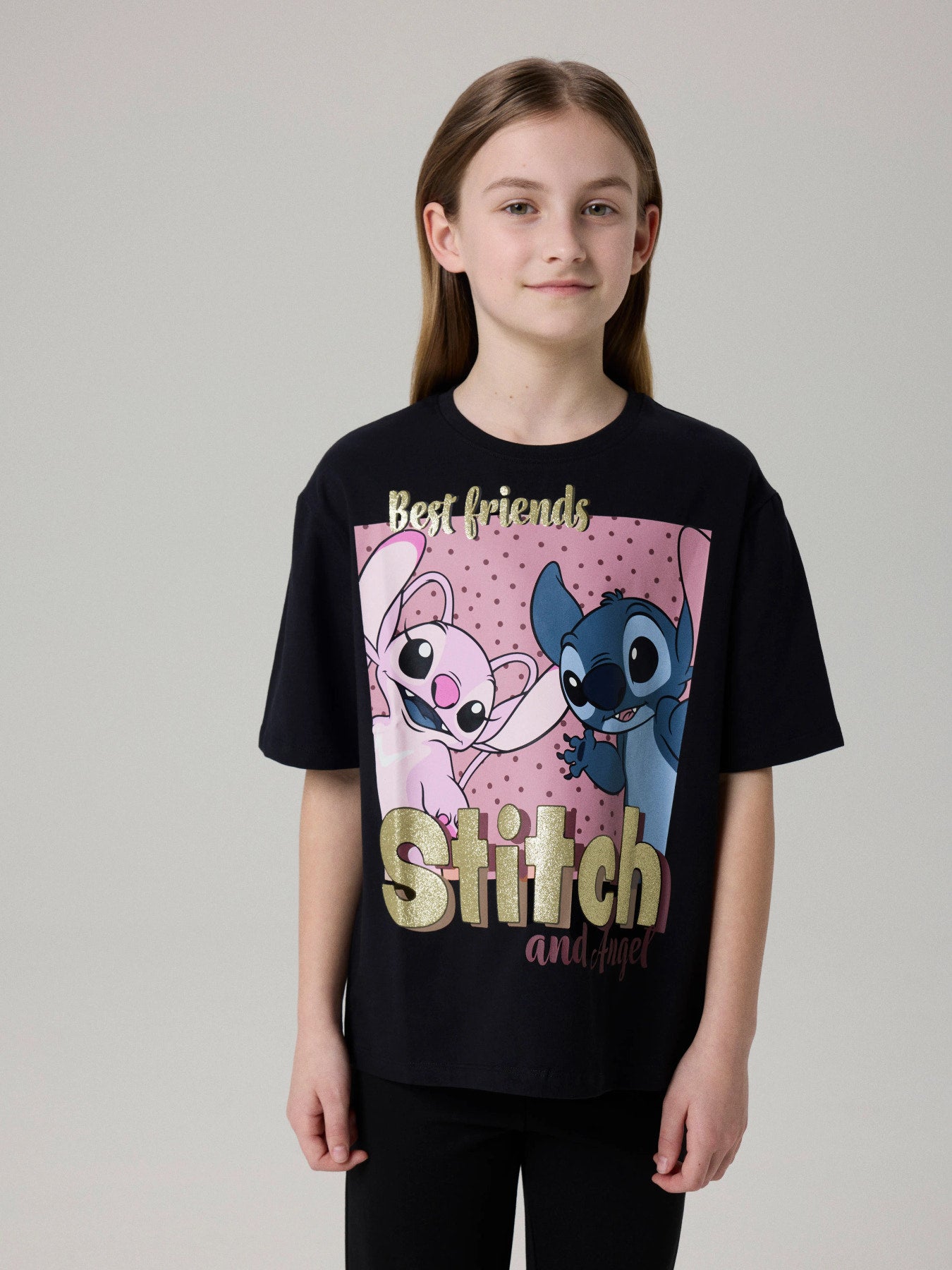 Name It Adara svart t-shirt med Disney Stitch och Angel samt glittertryck för kids flicka.