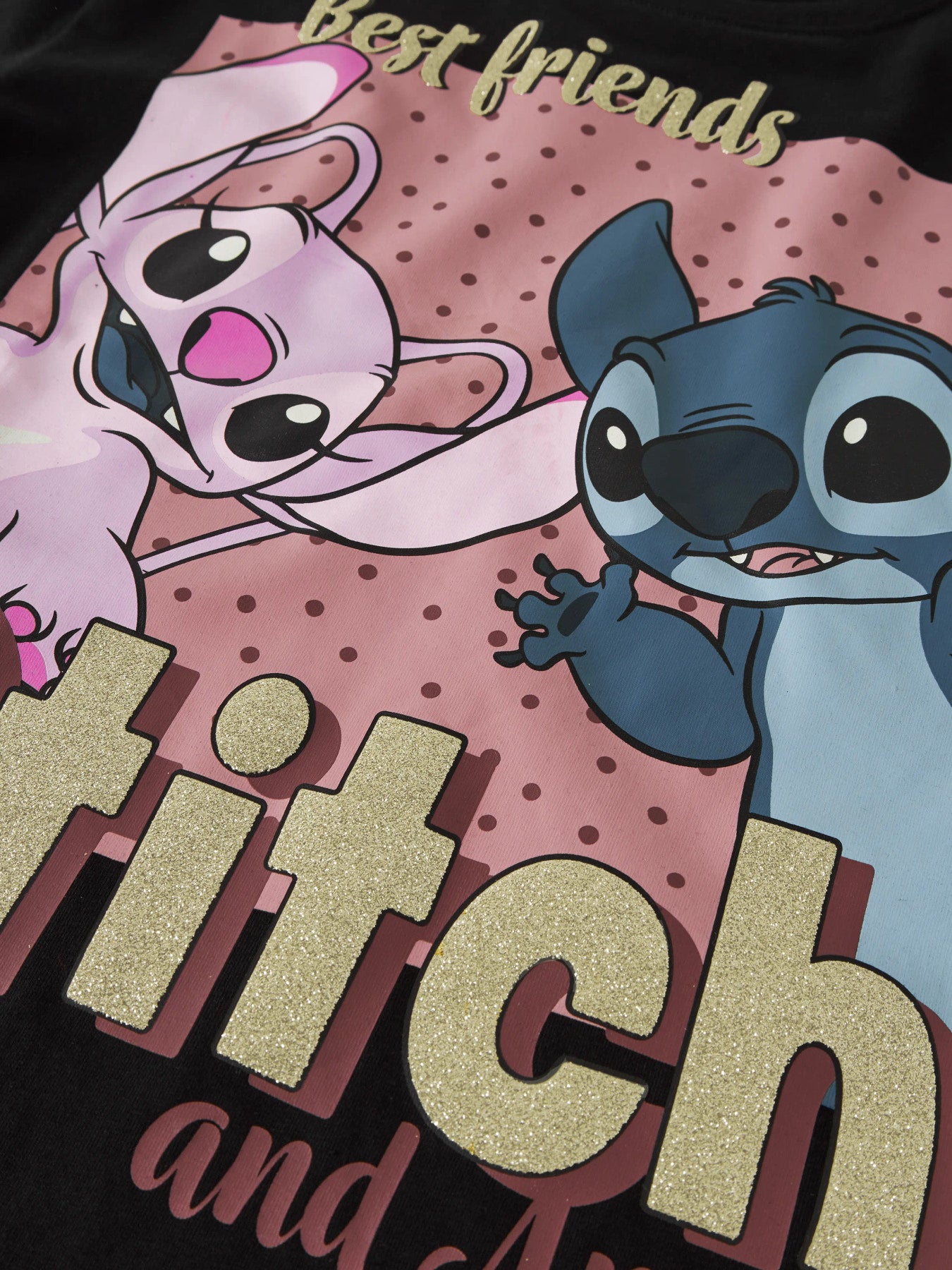 Name It Adara svart t-shirt med Disney Stitch och Angel samt glittertryck för kids flicka.