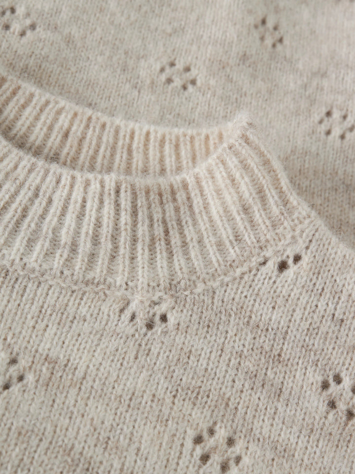 LMTD Namelyn kort stickad tröja ungdom flicka oatmeal beige med hålstickat mönster