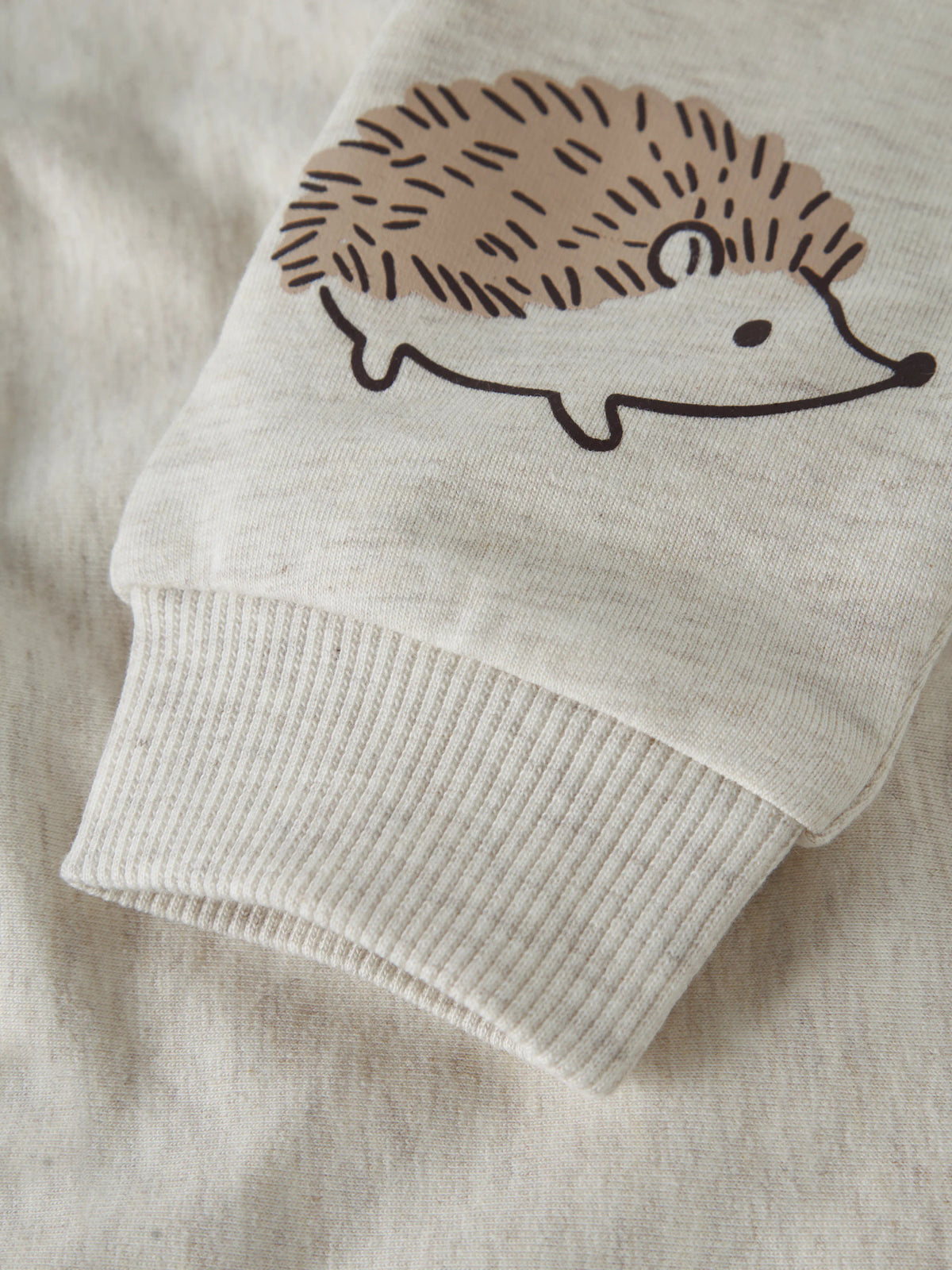 Name It Obbas beige mjukisbyxa baby unisex med igelkottar och nedvikbar midja