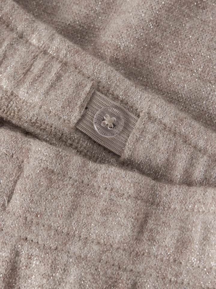 Rammi beige glitterbyxor till flicka från Name It med vida ben, reglerbar resår i midjan